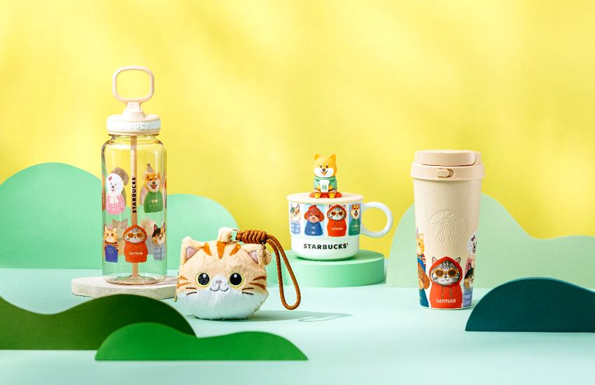 星巴克線上限定毛孩系列商品，包含斑紋貓造型零錢包與柴犬杯蓋馬克杯。
